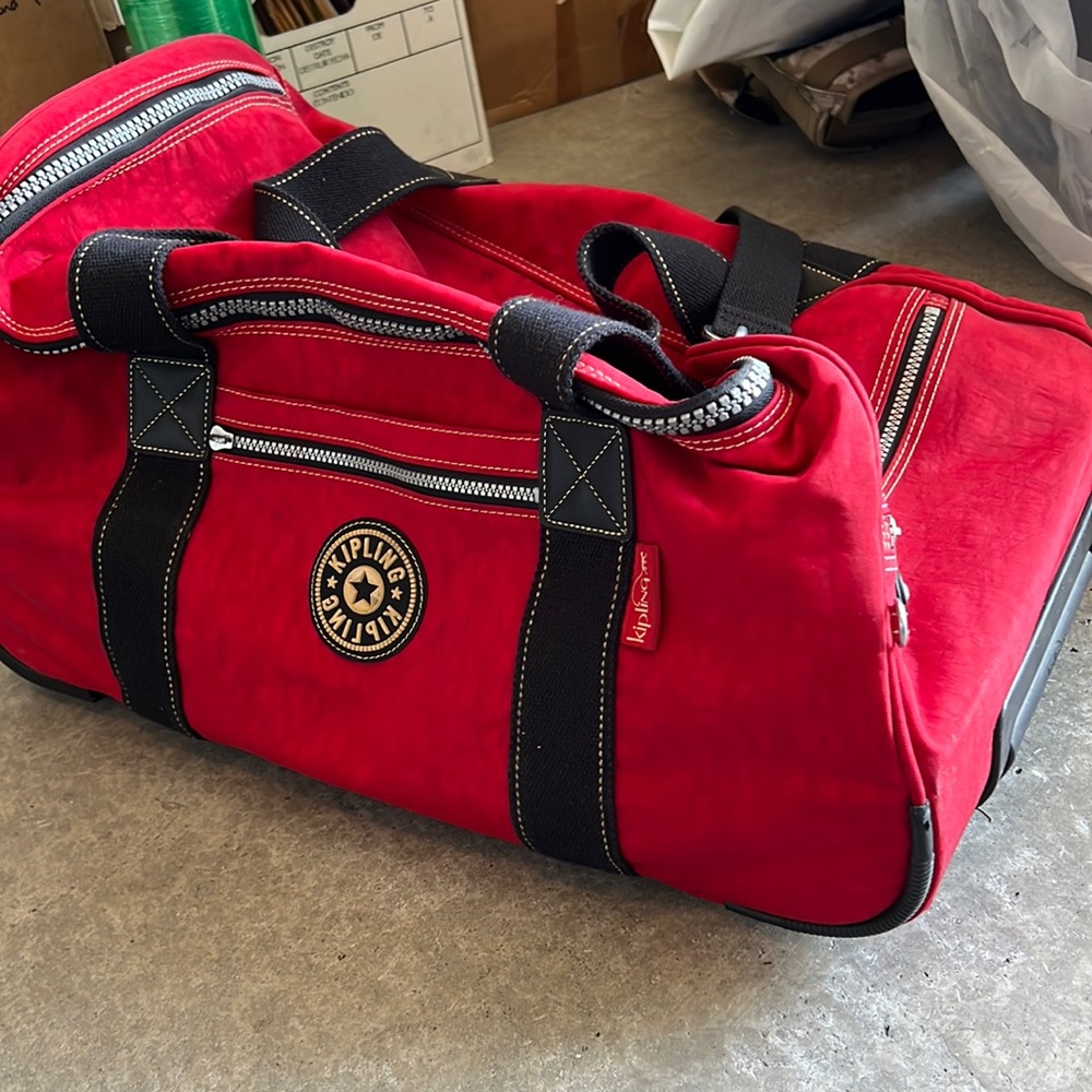 Kipling rolling suitcase travel bag